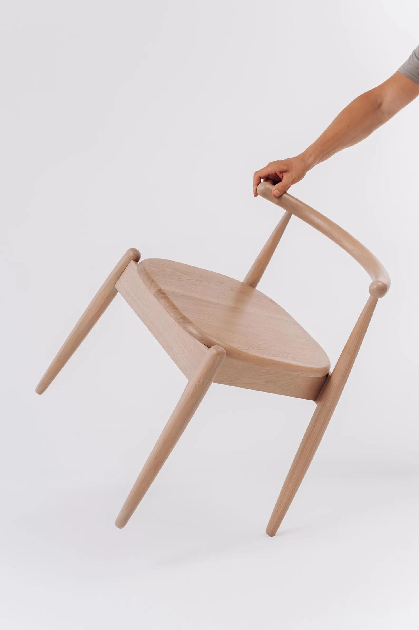 Detail of natural oak chair leg and smooth wood texture