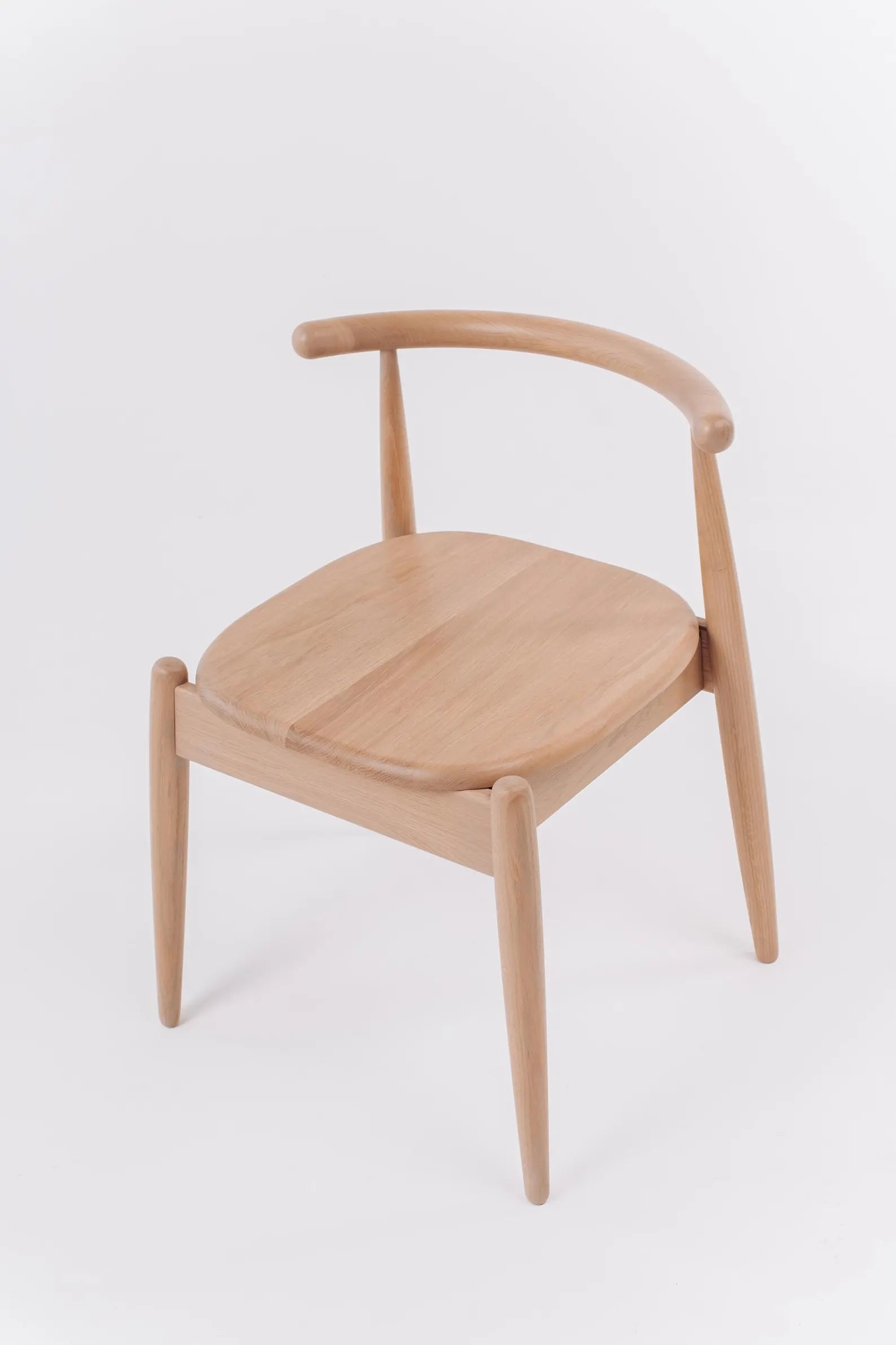 Detail of natural oak chair leg and smooth wood texture