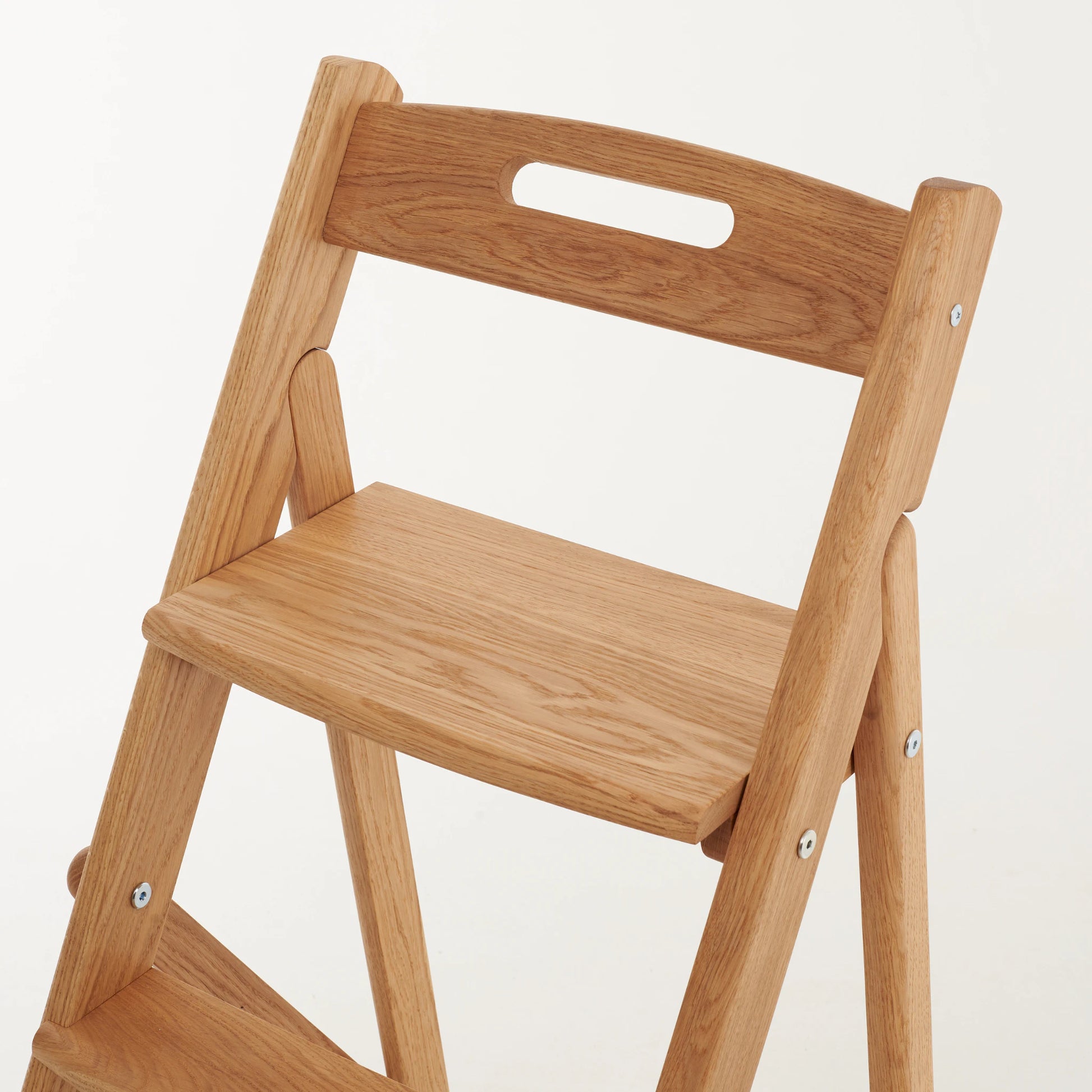 Close-up of natural oak wood grain on handmade ladder