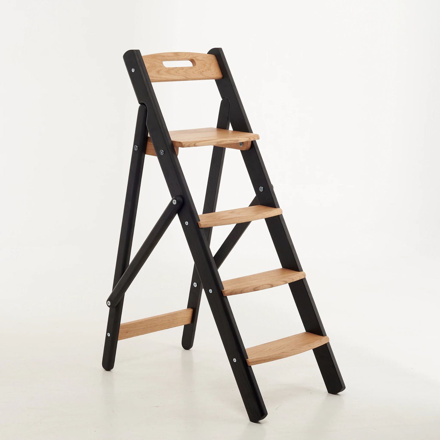 Glossy piano black finish on oak step ladder