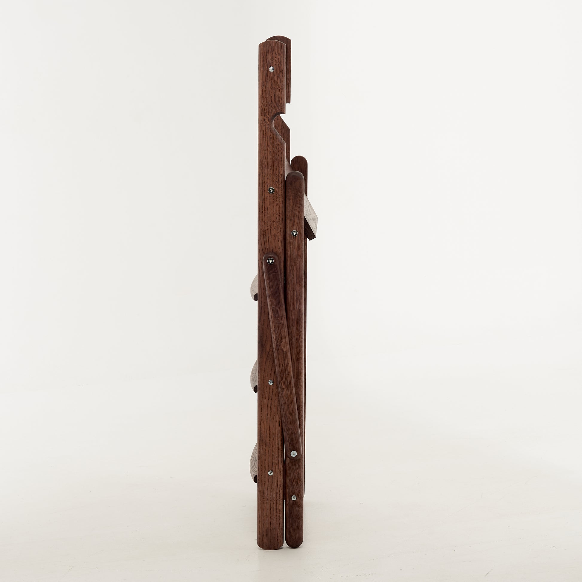 Folded oak ladder for easy storage in small spaces

