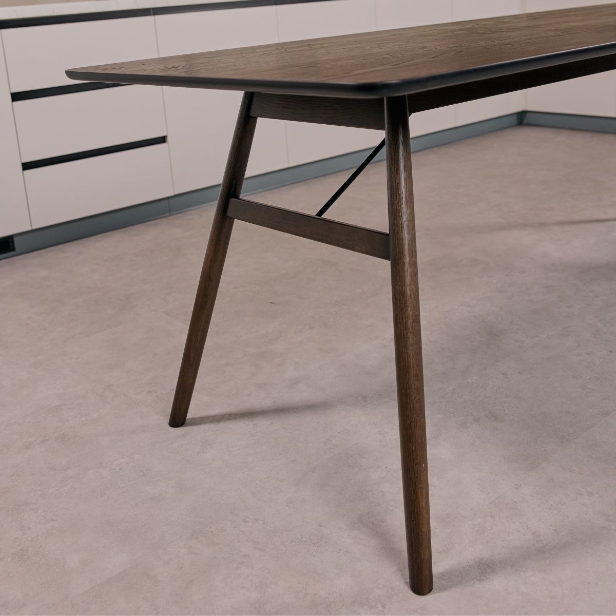 Close-up detail of oak dining table finish with oil-wax and protective varnish