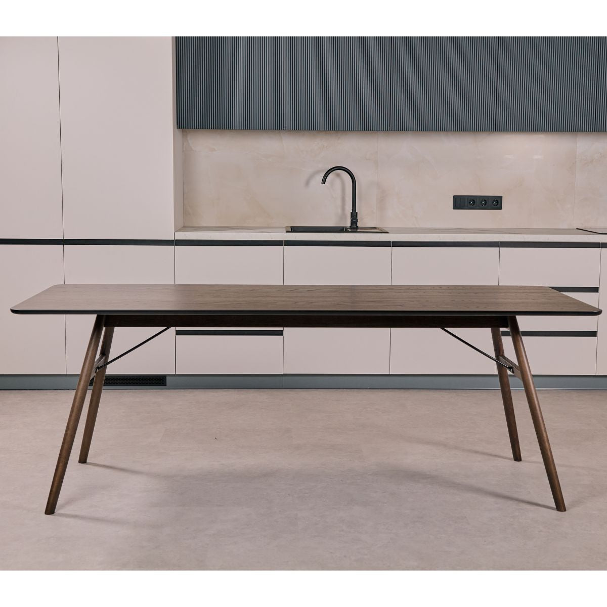 Rectangular oak dining table in contemporary dining room interior