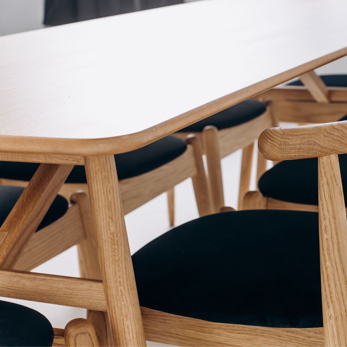 Scandinavian minimalist dining table side view on white background