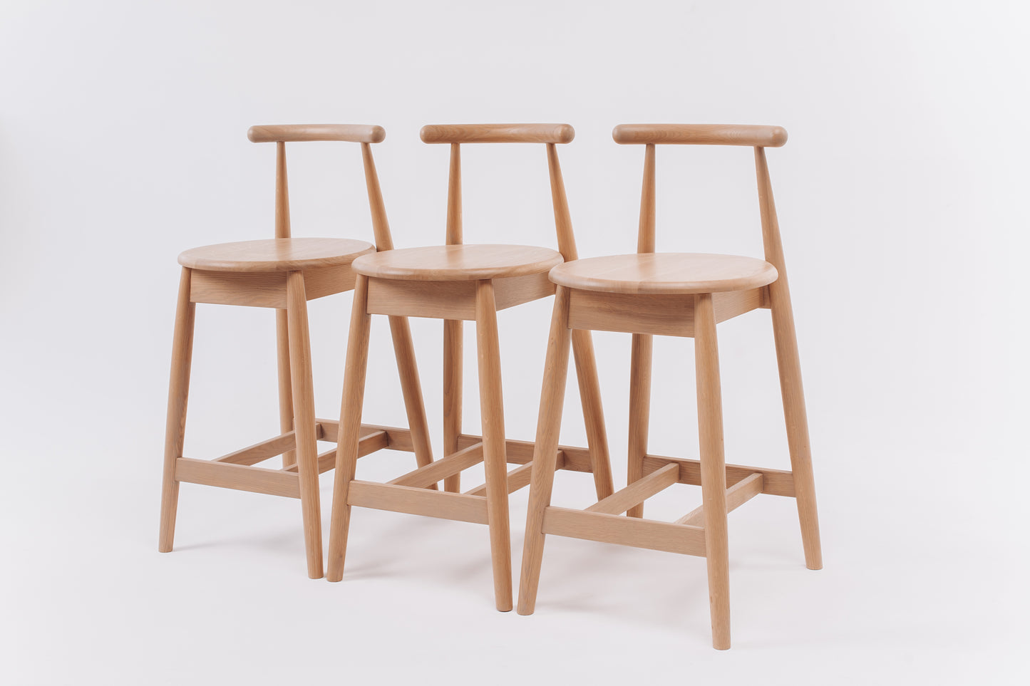 Bar stool made of light oak. Scandinavian style chair and Ukrainian craftsmanship.